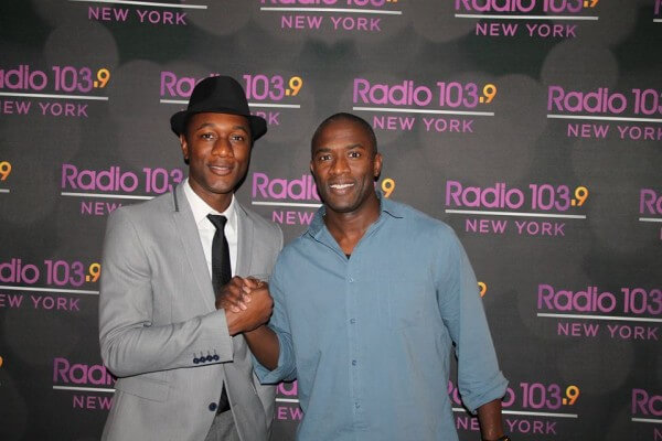 ><figcaption>ALOE BLACC and APD Raphael George</figcaption></figure>
<p><a href=