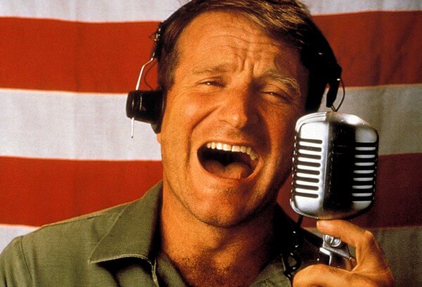 ><figcaption>The Late <strong>Robin Williams</strong> from the movie “GOOD MORNING VIETNAM”</figcaption></figure>
<p><em><strong class=