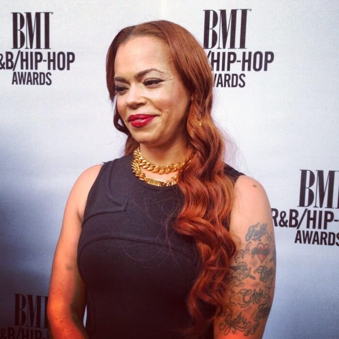 ><figcaption>Faith smiling on the BMI carpet.</figcaption></figure>
<figure class=