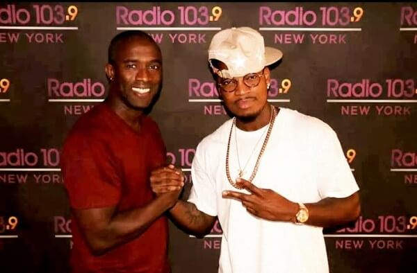 ><figcaption>APD Raphael George and Ne-Yo</figcaption></figure>
<p><a href=