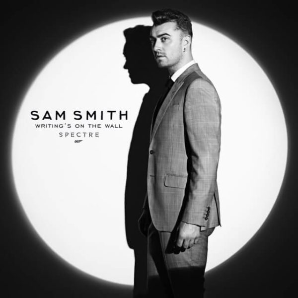 ><figcaption>Sam Smith To Sing Title Song To “SPECTRE” (PRNewsFoto/Sony Pictures Entertainment)</figcaption></figure>
<p>Albert R. Broccoli’s EON Productions, Metro-Goldwyn-Mayer Studios, and Sony Pictures Entertainment today confirmed that <strong>Sam Smith</strong> has recorded “Writing’s On The Wall,” the theme song to SPECTRE, the 24th <strong>James Bond</strong> adventure. <strong>SPECTRE</strong> will be released in the UK on October 26 and in the US on November 6. The song, released by Capitol Records, will debut and be available to purchase and stream on September 25.<br />Multi-platinum selling artist <strong>Sam Smith</strong> has co-written the title song, “Writing’s On The Wall,” with fellow GRAMMY� Award winner <strong>Jimmy Napes</strong>. It is the first <strong>James Bond</strong> theme song recorded by a British male solo artist since 1965. Smith’s debut album In The Lonely Hour launched at No. 1 in the UK and bowed in at No. 2 in the US, and has since earned five No.1 UK singles, four GRAMMY� Awards, three Brit Awards, six MOBO Awards, Q and AMA Awards.<br />Commenting on the announcement, Michael G. Wilson and Barbara Broccoli, the producers of SPECTRE, said, “Sam and Jimmy have written the most inspirational song for <strong>SPECTRE</strong> and with Sam’s extraordinary vocal performance, ‘Writing’s On The Wall’ will surely be considered one of the greatest Bond songs of all time.”<br />Smith said, “This is one of the highlights of my career. I am honoured to finally announce that I will be singing the next Bond theme song. I am so excited to be a part of this iconic British legacy and join an incredible line up of some of my biggest musical inspirations. I hope you all enjoy the song as much as I enjoyed making it.”<br />The 23 previous <strong>James Bond</strong> theme songs make up some of the most memorable movie music of all time. The previous Bond theme song, “Skyfall,” was performed by Adele, and was honored with the Academy Award� and <strong>Golden Globe Award</strong> for Best Original Song, the Brit Award for British Single of the Year, and the Grammy Award for Best Song Written for Visual Media.</p><div class='code-block code-block-8' style='margin: 8px auto; text-align: center; display: block; clear: both;'>
<div style=