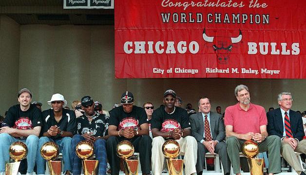 ><figcaption>CHICAGO, IL – JUNE 16: From left, <strong class='StrictlyAutoTagBold'>Chicago Bulls</strong> players Toni Kukoc, Ron Harper, Dennis Rodman, Scottie Pippen, and Michael Jordan sit with Chicago Mayor Richard Daley, Bulls head coach <strong class='StrictlyAutoTagBold'>Phil Jackson</strong> and Illinois Governor Jim Edgar at the team’s NBA championship rally in Chicago, IL 16 June. In the NBA Finals, the Bulls defeated the Utah Jazz four-games-to-two to win their third straight title and their sixth in eight years. (Photo credit should read PETER PAWINSKI/AFP/Getty Images)</figcaption></figure>
<p>On today’s episode of CBS Sports Radio’s Gio & Jones, former <strong class='StrictlyAutoTagBold'>Chicago Bulls</strong> guard and Michael Jordan’s teammate, B.J. Armstrong, joined Gregg Giannotti and Brian Jones to discuss the differences between today’s NBA teams and the teams of his era. Armstrong commented that Jordan’s Bulls couldn’t play in today’s era nor could the Warriors play in the ’90s because both teams were constructed and played by the rules of their eras. See key quotes below.</p>
<p>Why you can’t compare the ’90s era to today’s NBA (7:50):<br />“I never try to compare eras because it’s so hard (with) the way teams were constructed due to the rules and the eras that you played in…that era in the ’90s was a very physical era. There was hand-checking, the rules of the game was different, there wasn’t as much emphasis on the three-point shot, and clearly the physicality was a different game. So I think that (Bulls) team was constructed for that era.”</p><div class='code-block code-block-8' style='margin: 8px auto; text-align: center; display: block; clear: both;'>
  <img src=