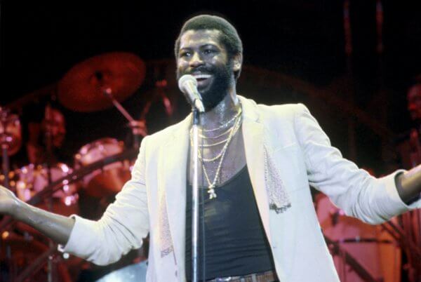 ><figcaption>UNSPECIFIED – SEPTEMBER 04: Photo of Teddy Pendergrass. (Photo by Michael Ochs Archives/Getty Images)</figcaption></figure>
<p>We have witnessed all sorts of shenanigans when celebrities die in regards to who controls their estates. Let’s add acclaimed and deceased soul singer <strong>Teddy Pendergrass</strong> to the mix of <strong>entertainers</strong> whose family embarked in a <strong>feud</strong> after their death.A Montgomery County Court judge has ruled that Teddy Pendergrass’s son submitted a fraudulent will to try to gain control of the singer’s estate. The decision from <strong>Judge Stanley Ott</strong> does not bode well for Theodore “Ted” Pendergrass II being that the Teddy senior’s estate will remain under the control of his second wife, Joan. Each side presented different versions of the late singer’s will. The will submitted by <strong>Joan Pendergrass</strong> made her the <strong>primary</strong> beneficiary. <strong>Ted Pendergrass</strong> II argued that a second will, dated May 2009, left the estate to him. Ott ruled that the second document was fraudulent. He also found that Ted Pendergrass’s testimony about the will was “wholly lacking in credibility,” according to the ruling, filed Tuesday. According to the testimony, <strong>Teddy Pendergrass</strong> died with little money but the fight in court had more to do with the fight over the singer’s legacy. According to Ted Pendergrass’s lawyer, he is planning to appeal the ruling, therefore, the saga may continue. Teddy was also in the news <a href=