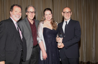 ><figcaption>SESAC’s Dennis Lord, composer Jeff Beal, SESAC’s Erin Collins and Netflix’s Peter Friedlander during the “Visionary Award” presentation</figcaption></figure>
<p>SESAC, the nation’s most innovative performing <strong>rights</strong> organization, honored its remarkable roster of top film and television composers with the annual sesac Film & Television Composers Awards Dinner. The invitation-only event which was held June 4 at the beautiful Casa Del Mar Hotel in Santa Monica, Calif., celebrated the composers of music featured in 2013’s biggest films, primetime television shows and cable programs.</p>
<p>The sesac event bestows awards to music composers in the categories of Network TV, Local TV, Cable TV, Film Composing and Jingles. sesac also acknowledged and honored composers for excellence in Streaming Music, marking the first time ever a <strong>PRO</strong> has acknowledged and awarded the music in streaming media outlets.</p><div class='code-block code-block-8' style='margin: 8px auto; text-align: center; display: block; clear: both;'>
  <img src=